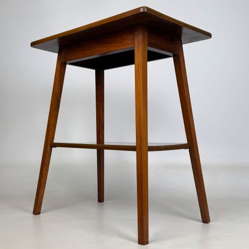 fig 1. An Edwardian walnut side table featuring square apron framing, four splayed tapered legs, and an integrated lower undertier shelf.