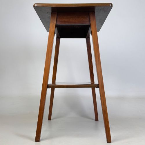 fig 2. An Edwardian walnut side table featuring square apron framing, four splayed tapered legs, and an integrated lower undertier shelf.