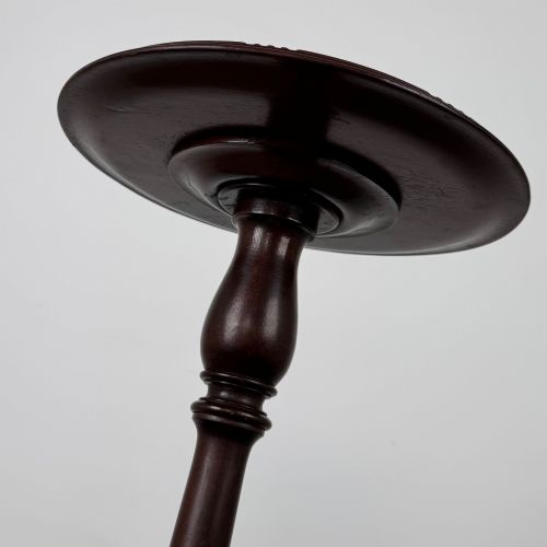 fig 4. A tall 19th-century Georgian style mahogany torchere stand featuring a circular dished top, turned column, and carved tripod cabriole legs.