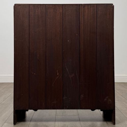 fig 5. An antique narrow mahogany open bookcase featuring three tiers, a gadrooned top edge, and carved bracket feet.