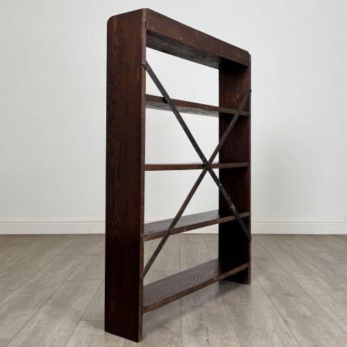 fig 4. A dark oak open bookcase featuring five shelves and a black metal rear X-brace.