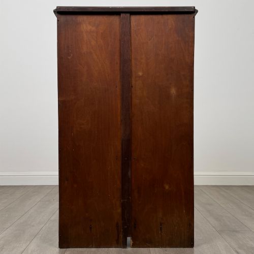 fig 5. An antique walnut display cabinet featuring glazed door and side panels, decorative inlay along the frieze, and an open lower shelf resting on turned front legs.