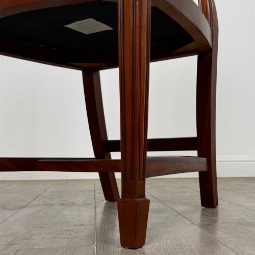 fig 5. A set of eight mahogany shield back dining chairs featuring intricate pierced back splats and light cream upholstered seats.