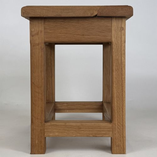 fig 6. A solid oak rectangular joint stool featuring visible wooden dowel joinery and a sturdy base with lower stretchers.