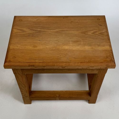 fig 8. A solid oak rectangular joint stool featuring visible wooden dowel joinery and a sturdy base with lower stretchers.