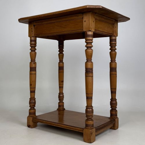 fig 1. A small 19th-century Victorian oak side table featuring turned legs, a rectangular top, and a lower shelf.