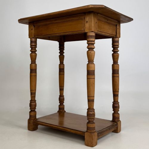 fig 5. A small 19th-century Victorian oak side table featuring turned legs, a rectangular top, and a lower shelf.