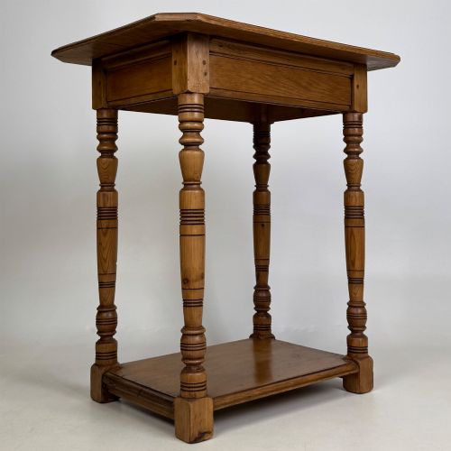 fig 7. A small 19th-century Victorian oak side table featuring turned legs, a rectangular top, and a lower shelf.