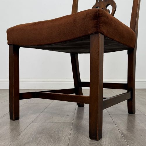 fig 4. A set of six dark wood Georgian style dining chairs featuring pierced splat backs and dark brown velvet upholstered seats.