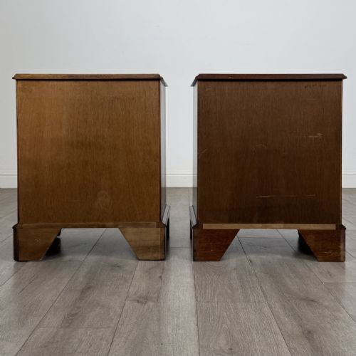 fig 5. A matching pair of Georgian style mahogany bedside chests with serpentine fronts, three drawers each, brass ring handles, and bracket feet.