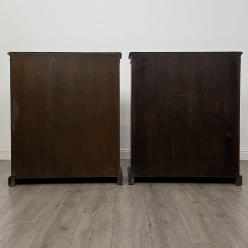 fig 4. A matching pair of dark brown oak open bookcases featuring carved cornices and four open tiers on plinth bases.