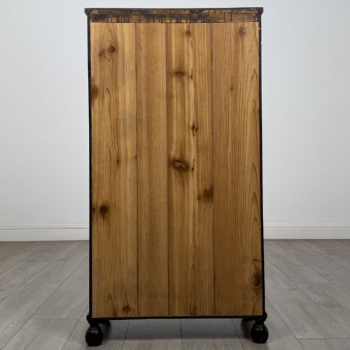 fig 4. A small dark wood open bookcase featuring three shelves, a carved lunette top frieze, reeded side columns, and turned ball feet.