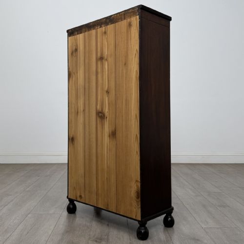 fig 5. A small dark wood open bookcase featuring three shelves, a carved lunette top frieze, reeded side columns, and turned ball feet.
