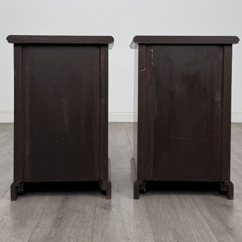 fig 5. A pair of Victorian burr walnut bedside cabinets featuring three drawers each with turned wooden knobs and a plinth base.