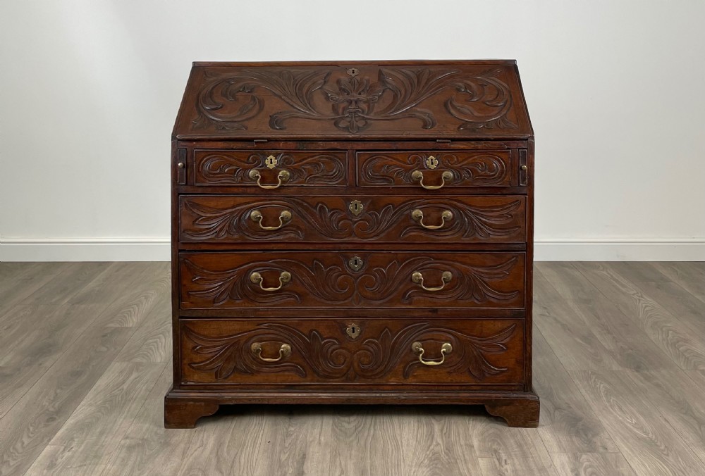 Antique 18th Century Heavily Carved Bureau In Oak