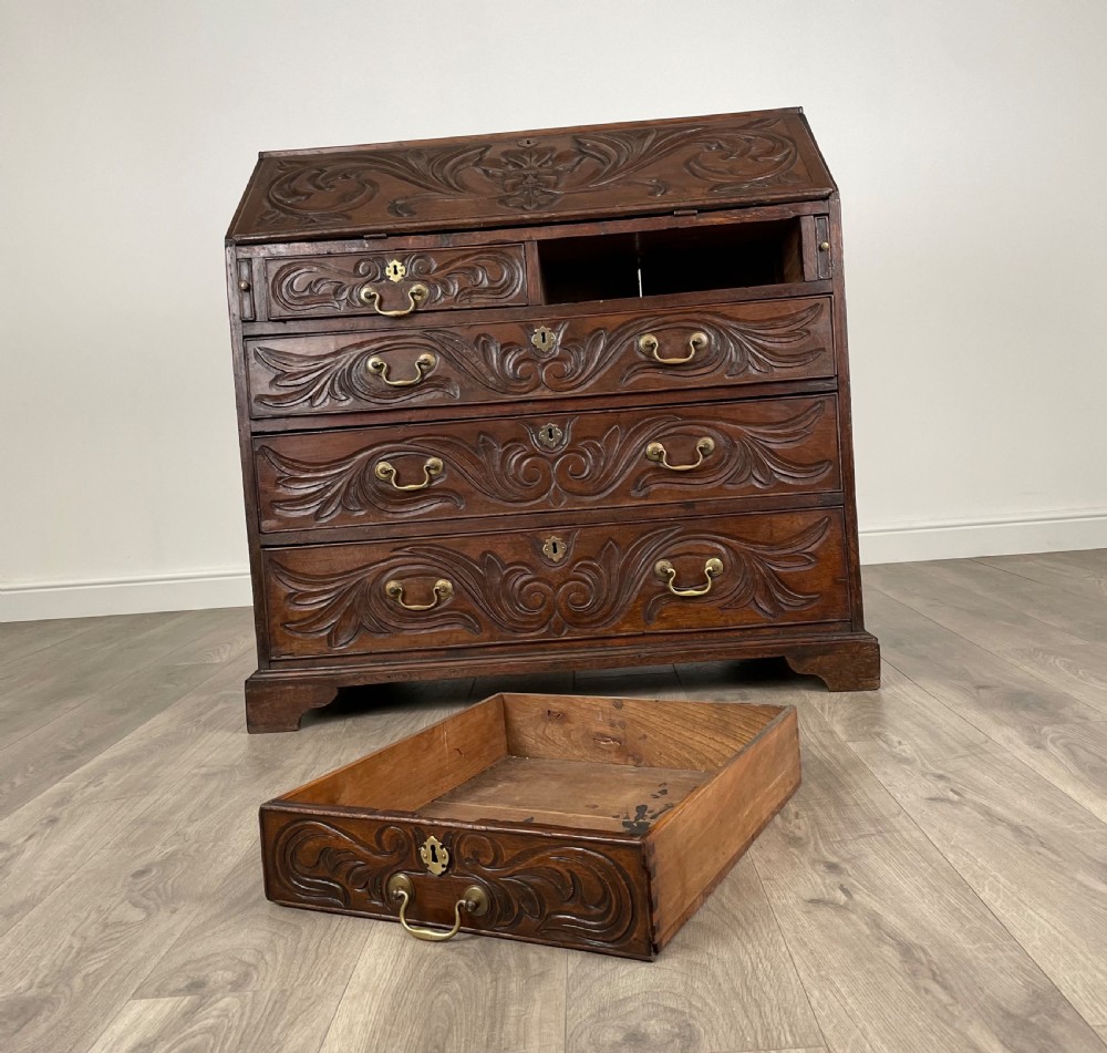 Antique 18th Century Heavily Carved Bureau In Oak View III
