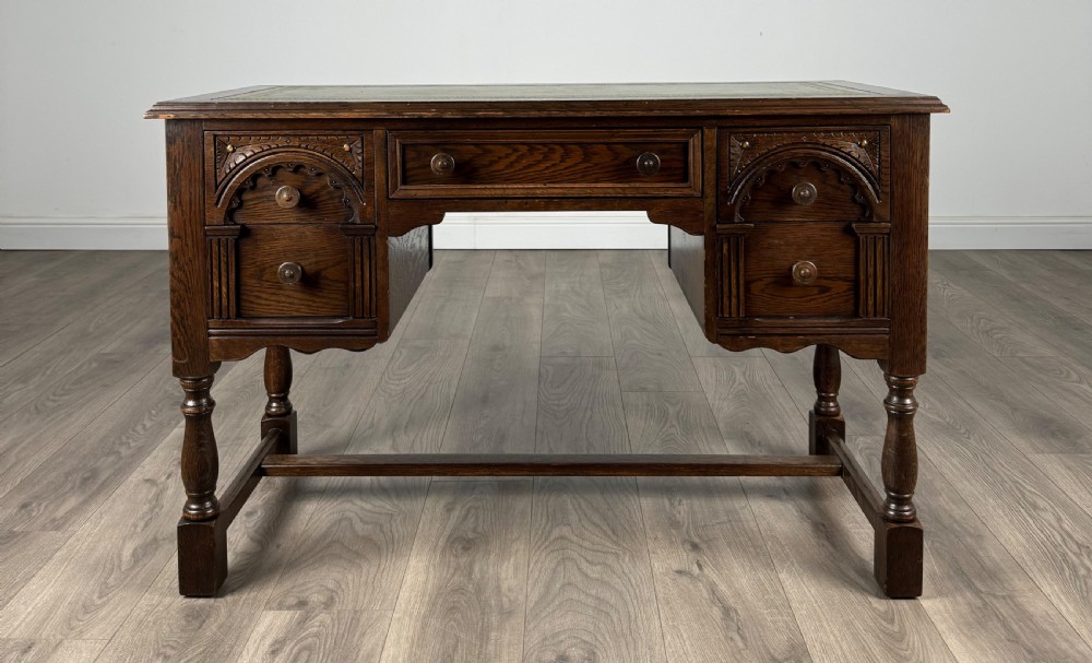 Antique 20th Century Leather Top Writing Desk In Oak