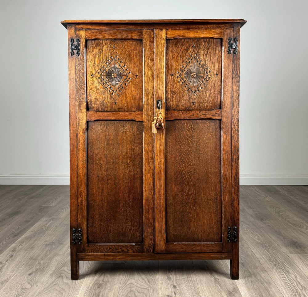 Antique 20th Century Carved Oak Wardrobe Of Small Proportion