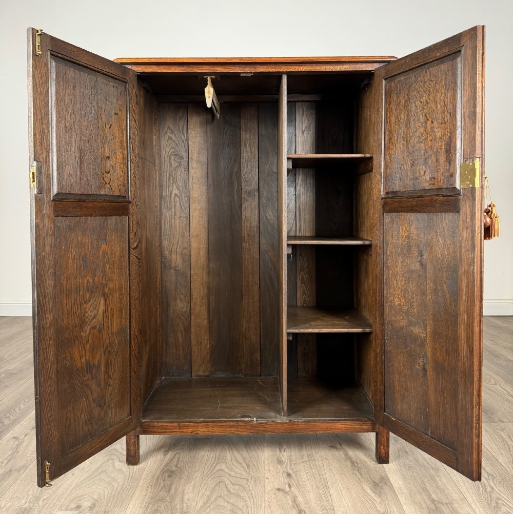 Antique 20th Century Carved Oak Wardrobe Of Small Proportion View II