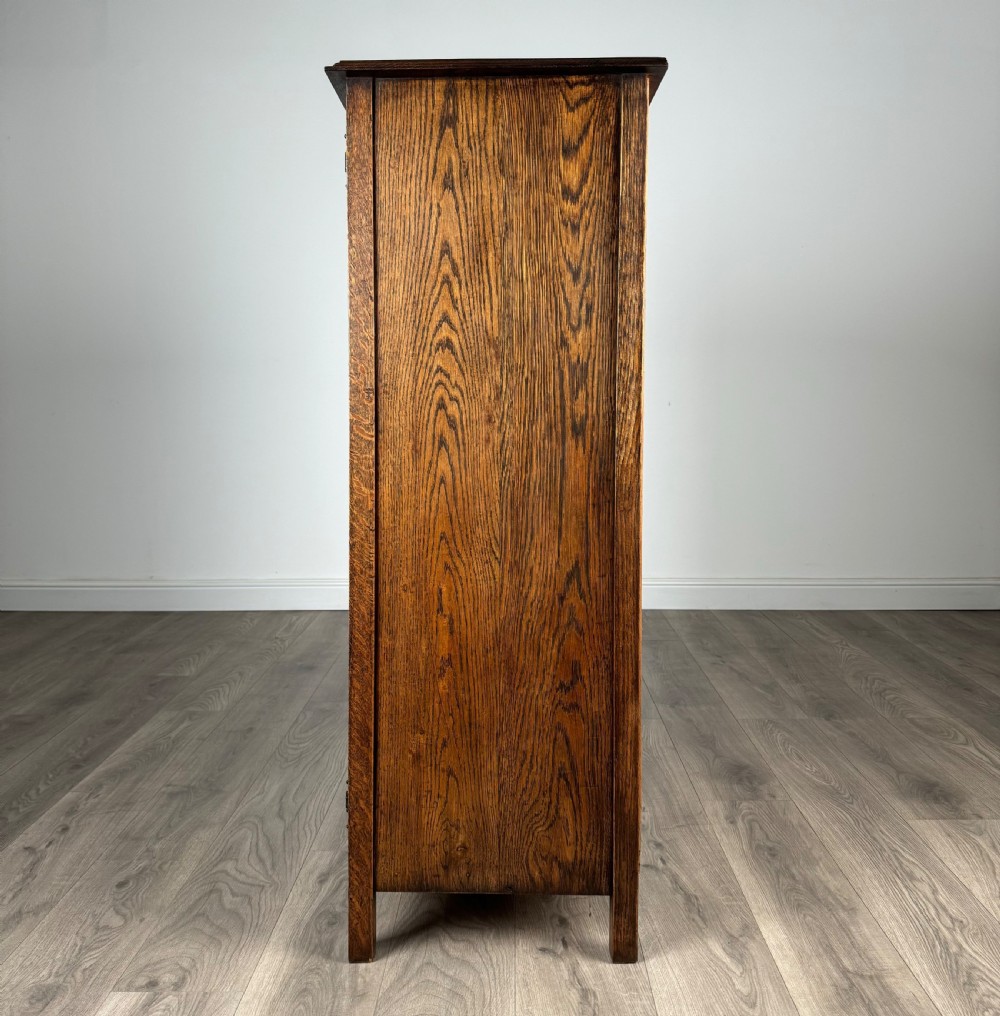 Antique 20th Century Carved Oak Wardrobe Of Small Proportion View IV