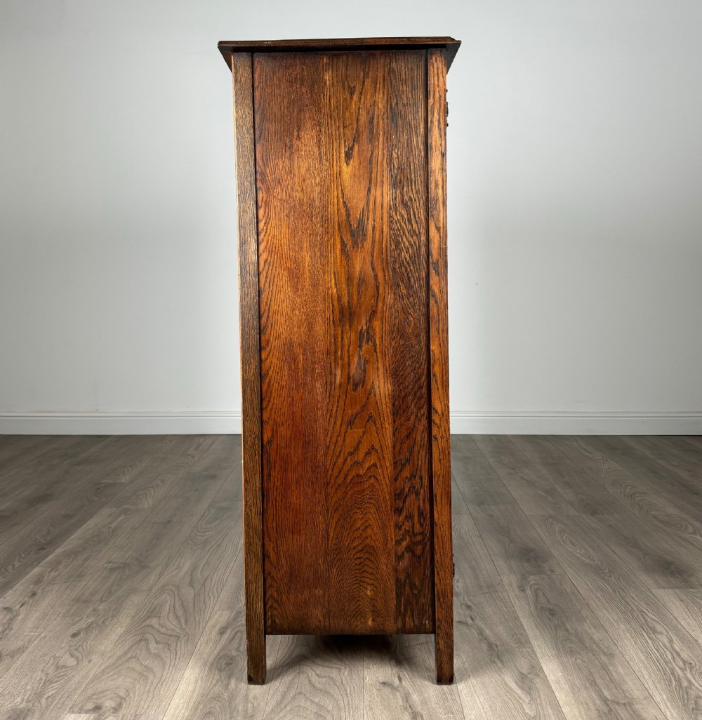 Antique 20th Century Carved Oak Wardrobe Of Small Proportion View VIII
