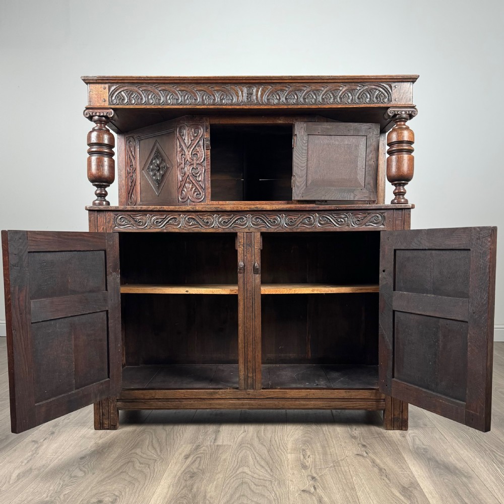 Antique 19th Century Heavily Carved Court Cupboard In Oak 
 View II