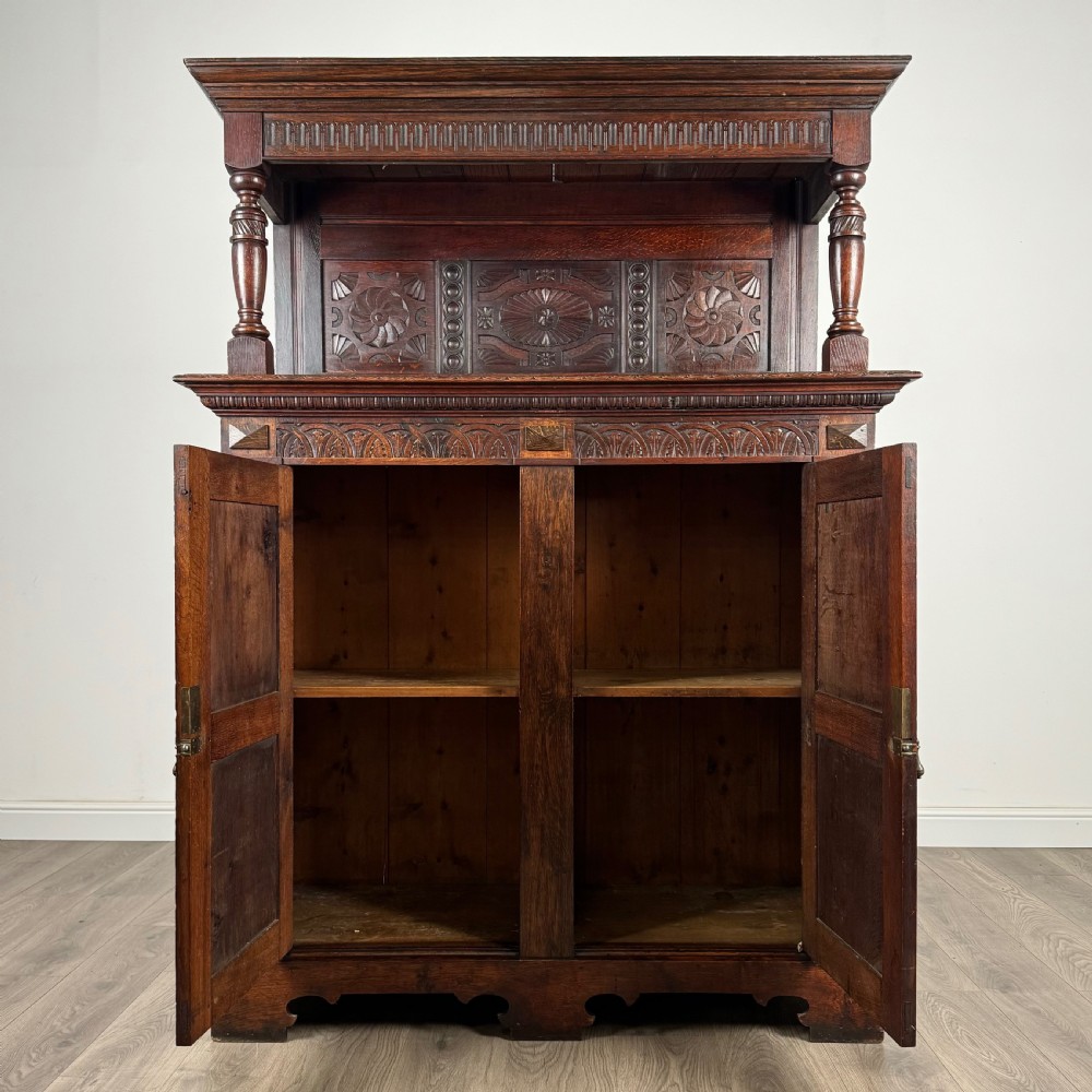  Antique 20th Century Carved Oak Cupboard 
 View II