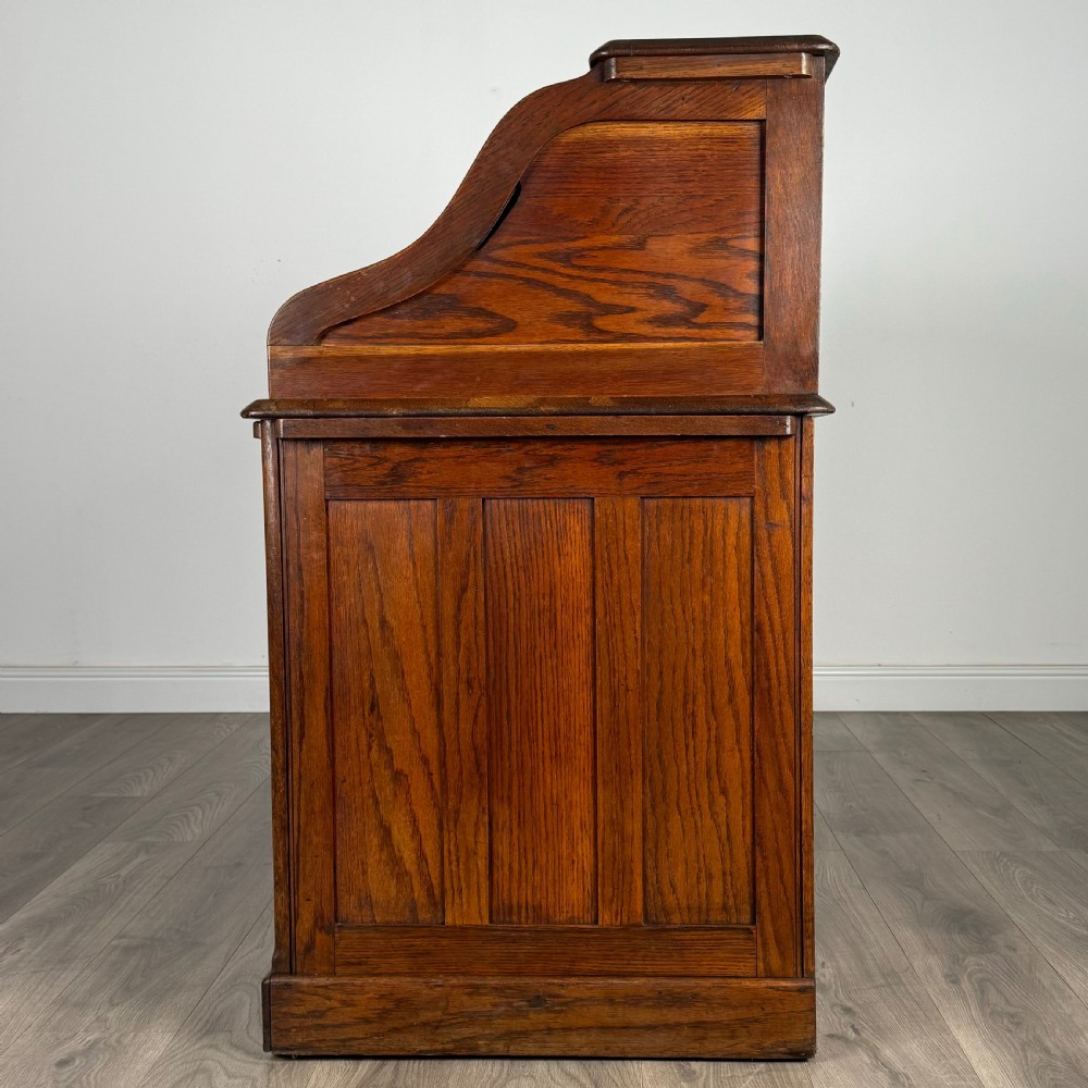  Antique 20th Century Roll Top Desk In Oak  View IV