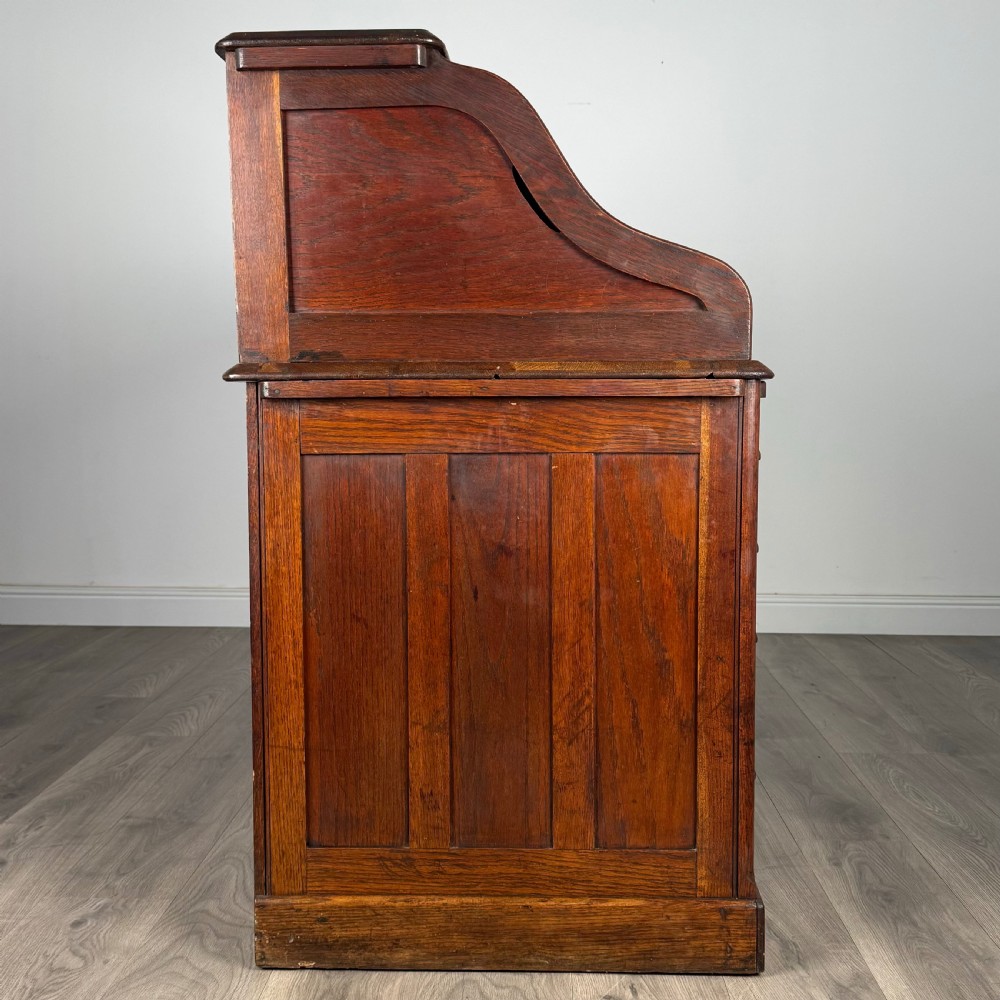  Antique 20th Century Roll Top Desk In Oak  View VIII