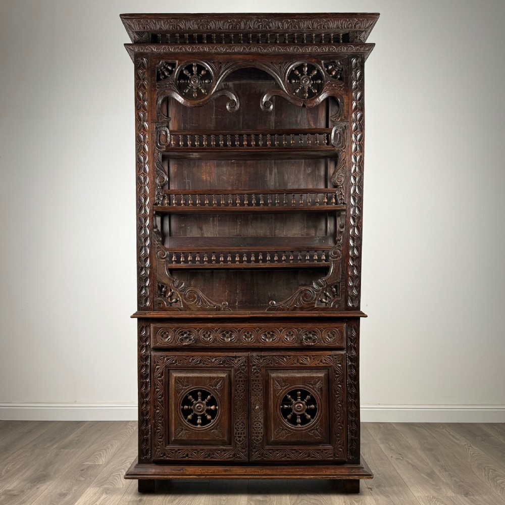 Antique 19th Century Heavily Carved French Breton Cabinet In Chestnut 