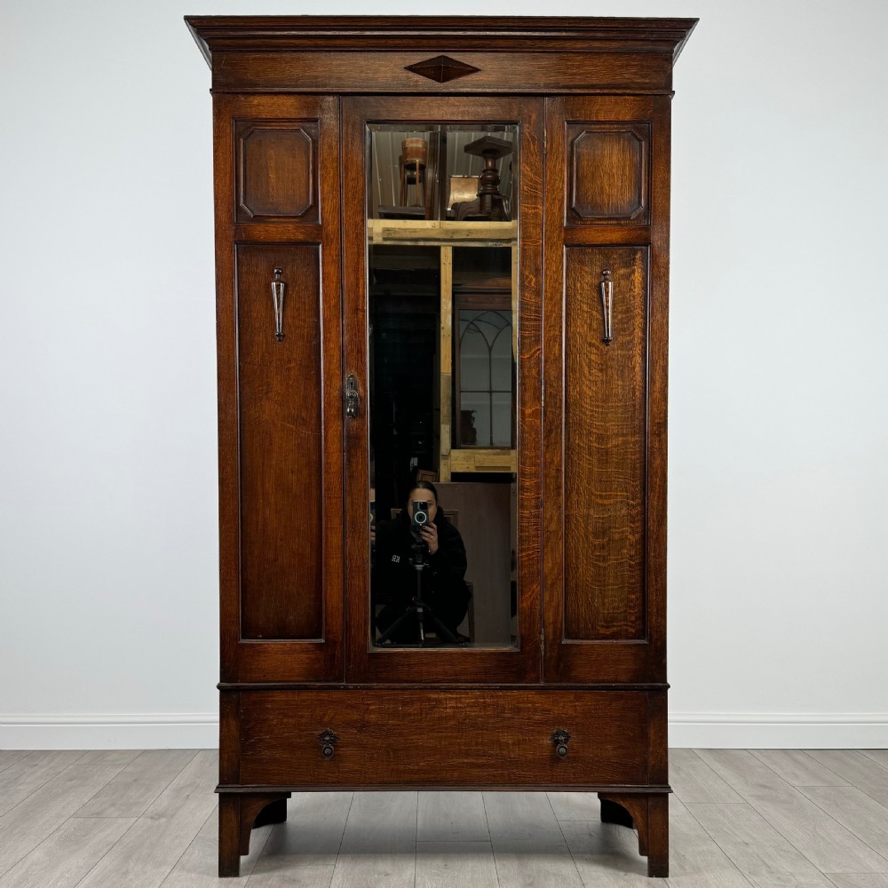 Antique 20th Century Jacobean Style Wardrobe In Oak