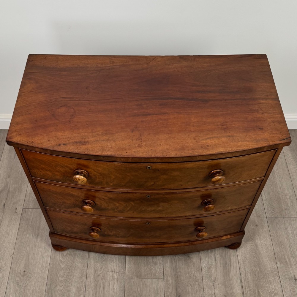  Antique 19th Century Small Bow Front Chest Of Drawers  View IX