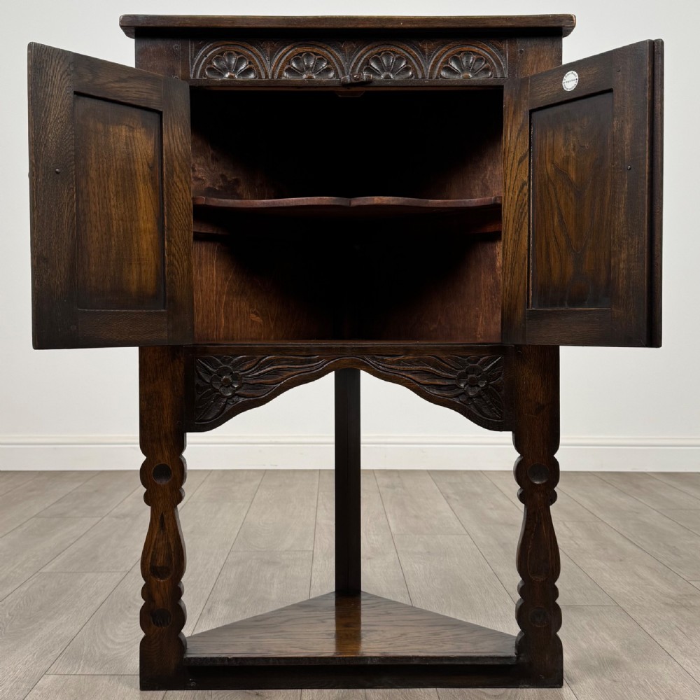 Antique 20th Century Small Carved Oak Corner Cabinet View II