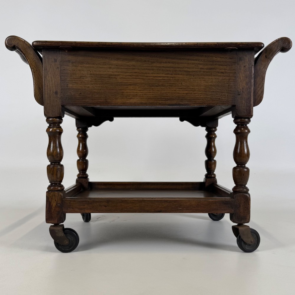  Antique 20th Century Oak Coffee Table On Casters  View VI