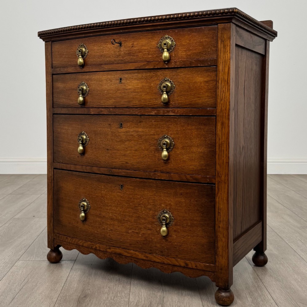  Antique 20th Century Small Bow Front Chest Of Drawers In Oak  View II