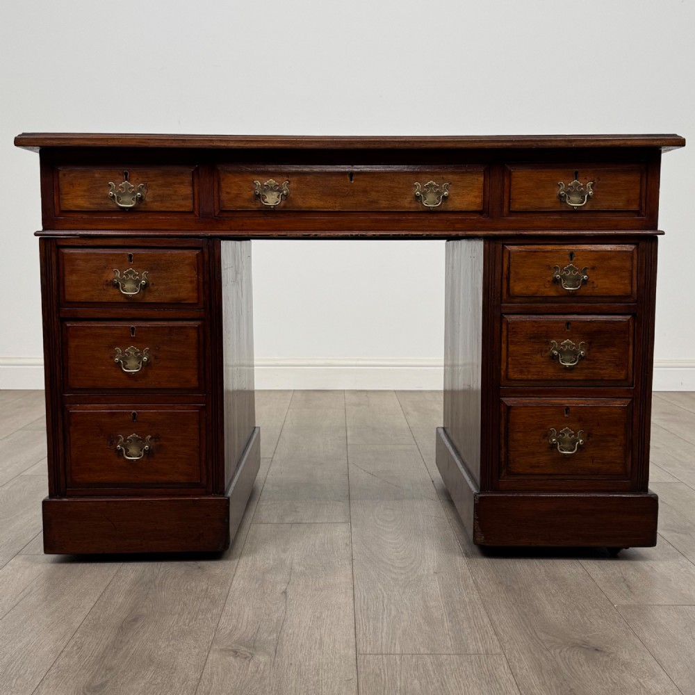 Antique 20th Century Leather Top Pedestal Desk In Walnut