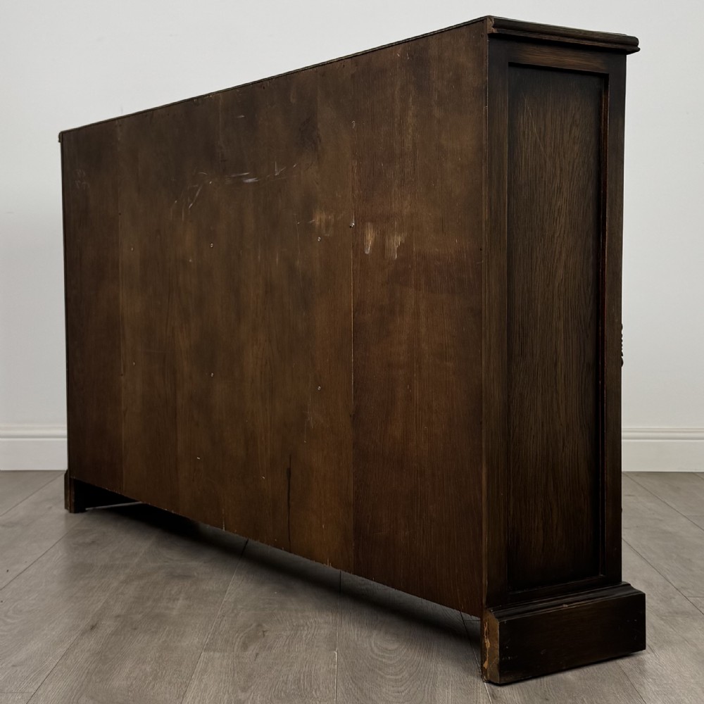 Antique 20th Century Carved Oak Linenfold Bookcase View VIII