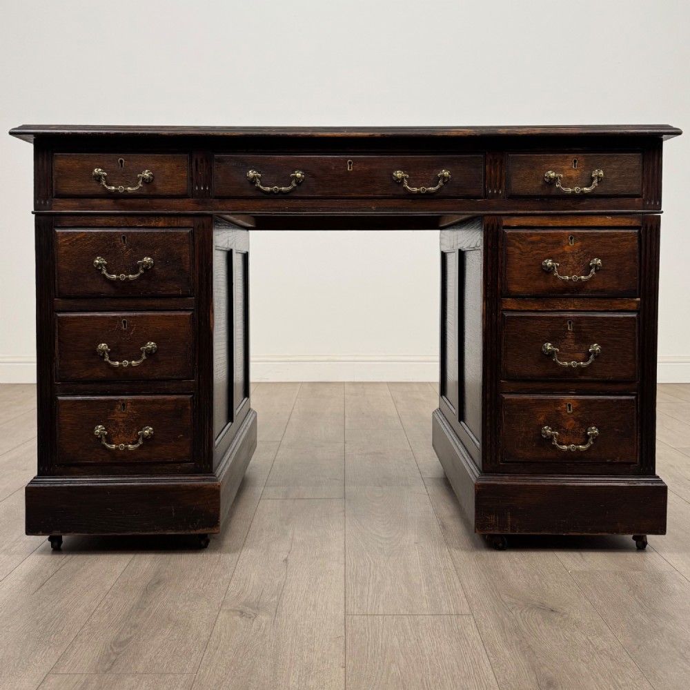 Antique 20th Century Leather Top Pedestal Desk In Oak