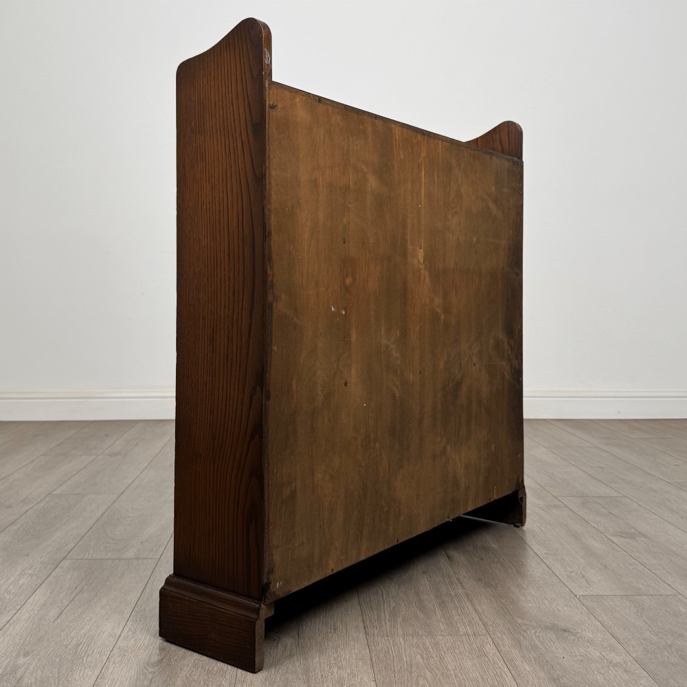 A twentieth-century dark oak open bookcase with three fitted shelves and profiled side edges. View V