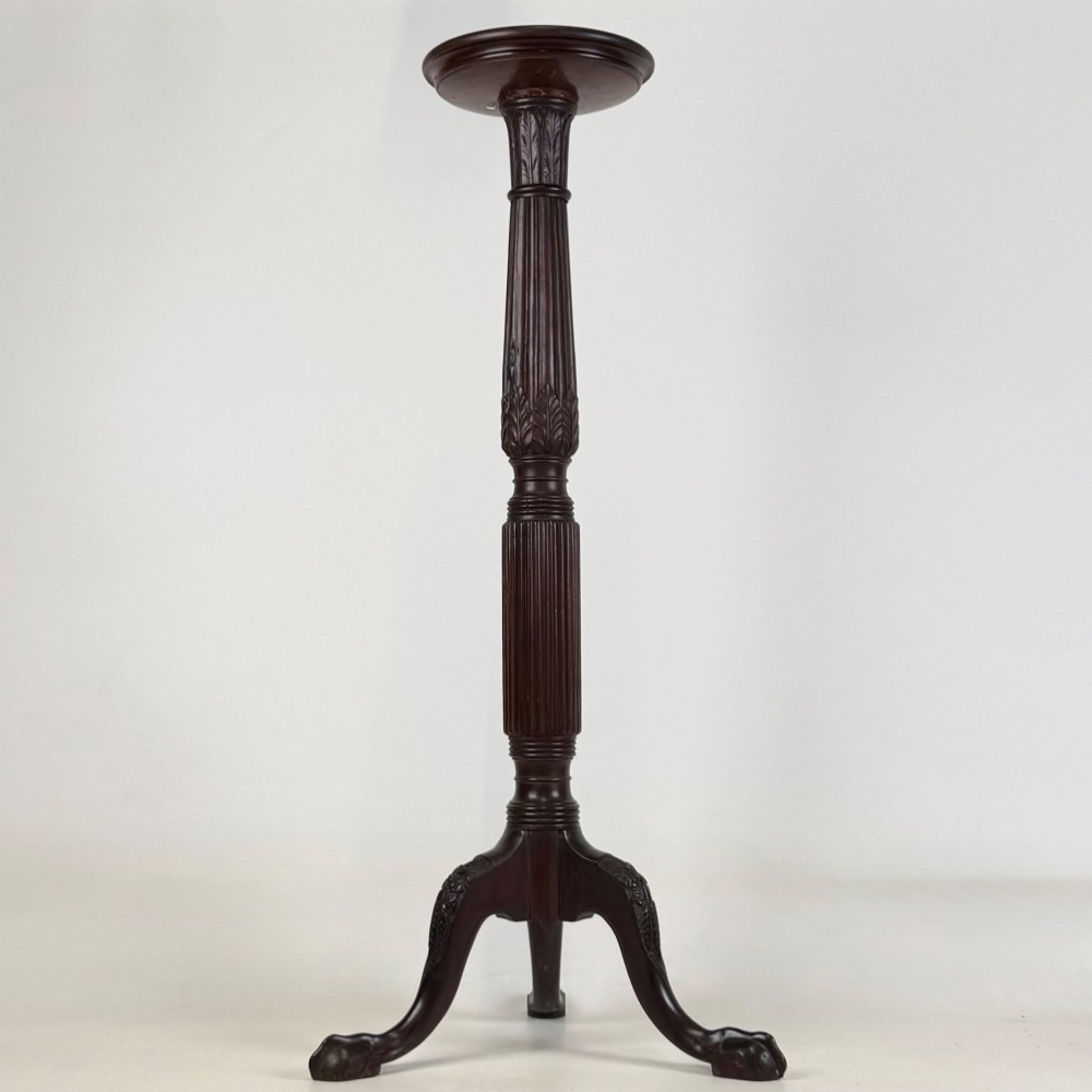 A tall Victorian dark mahogany plant stand featuring a carved fluted column, acanthus leaf details, and a tripod base. View II