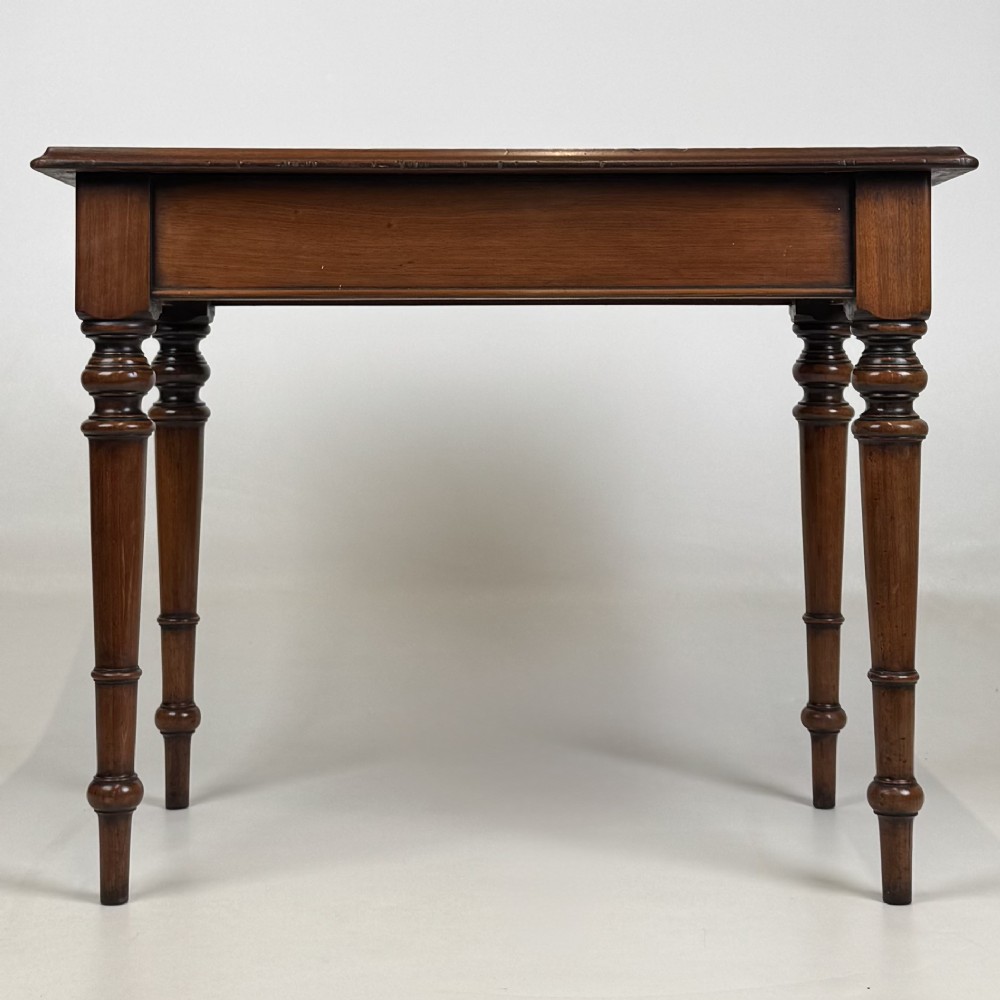 A 19th-century Victorian mahogany side table featuring a single drawer with two turned wooden handles and four turned legs. View V