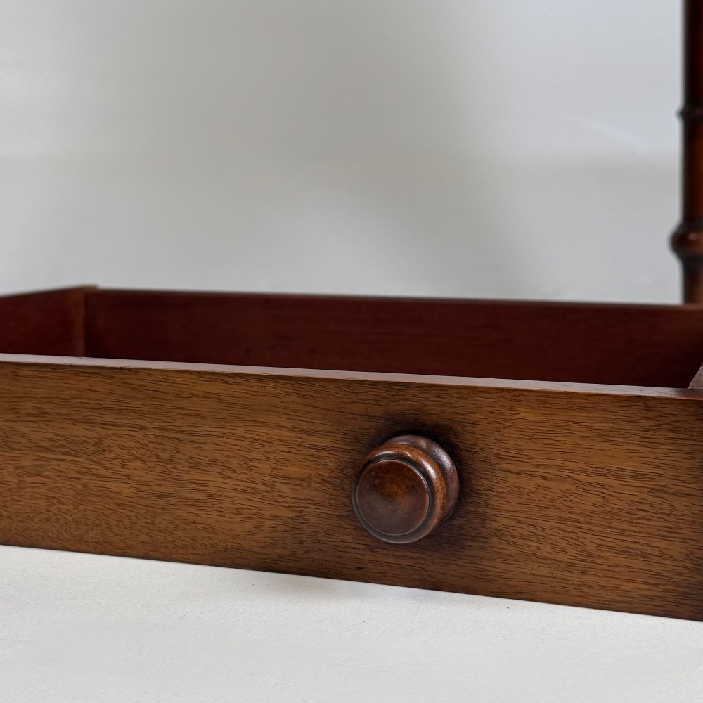 A 19th-century Victorian mahogany side table featuring a single drawer with two turned wooden handles and four turned legs. View XI