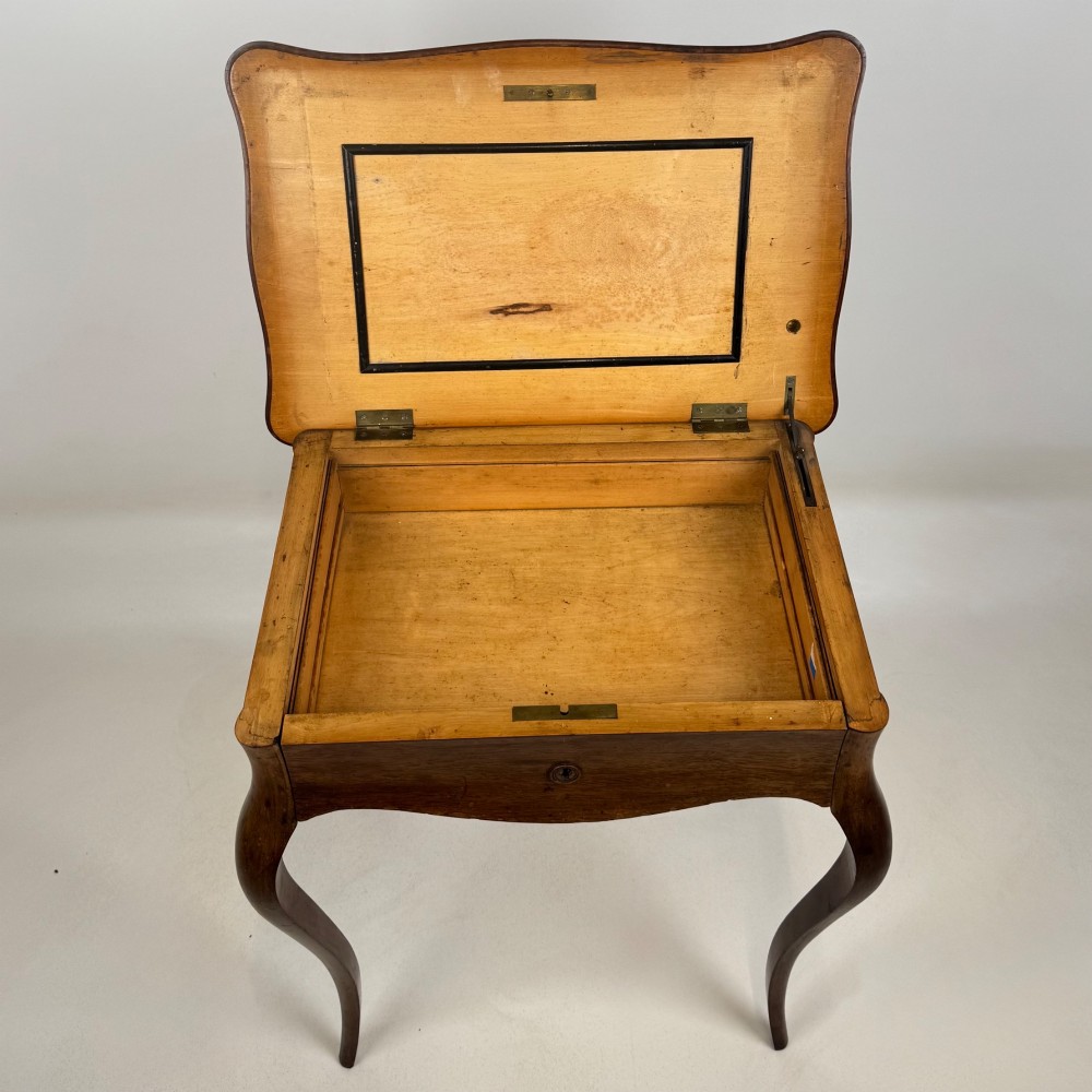 A 19th-century French mahogany side table featuring high cabriole legs, a single frieze drawer with a brass keyhole, and a shaped apron. View XI