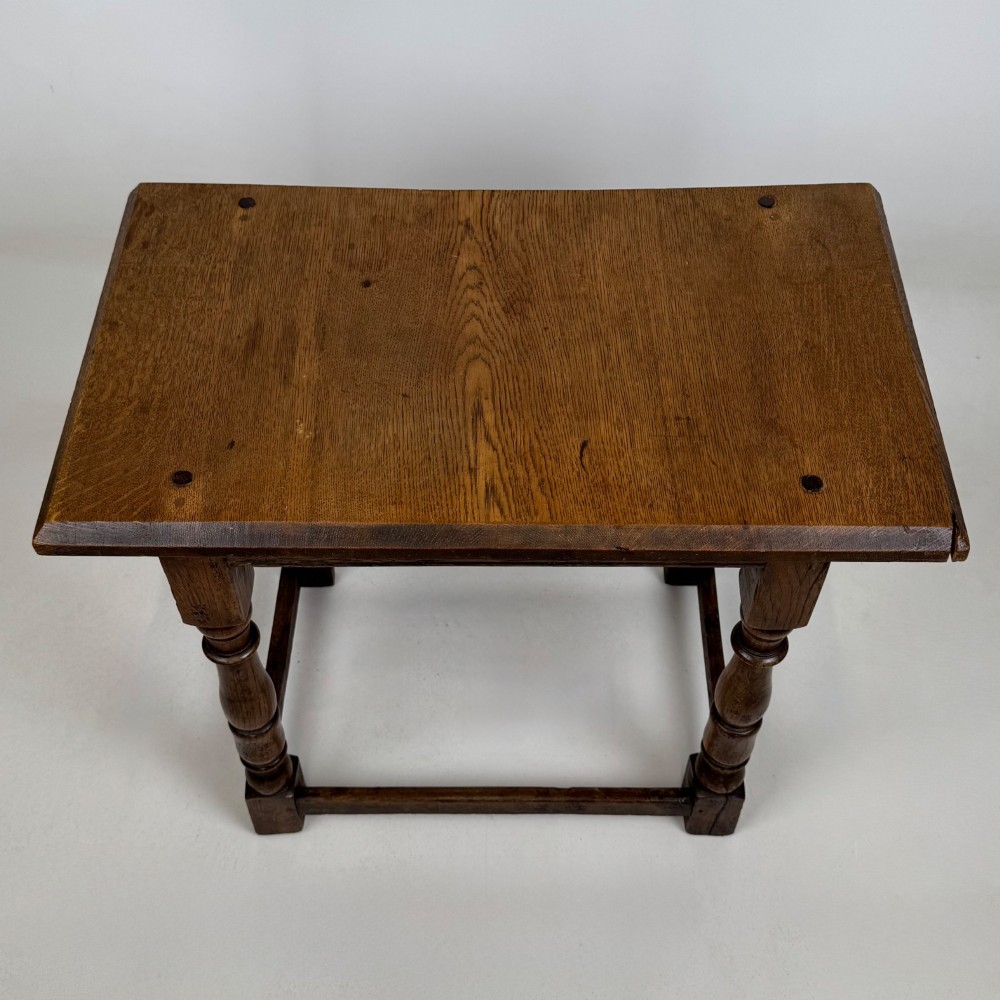 A 19th-century dark oak side table featuring a rectangular flat top, turned baluster legs, and sturdy lower stretchers. View IX