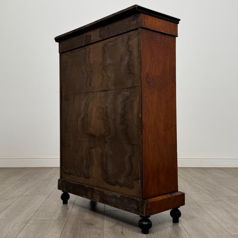 A 19th-century Victorian walnut pier cabinet featuring floral marquetry inlays, gilded metal mounts, and a single glazed door revealing interior shelves. View VII