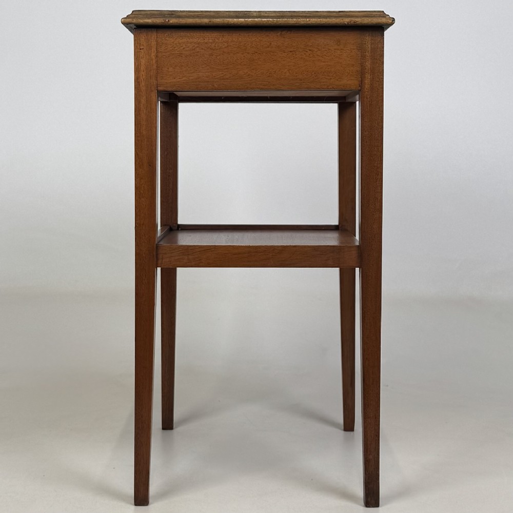 A pair of tall, slim mahogany bedside tables with single top drawers, round brass ring handles, open lower shelves, and tapered legs. View VIII
