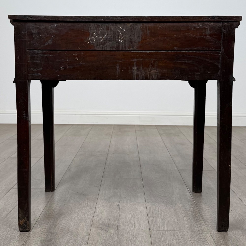 An 18th-century Georgian oak side table featuring a single frieze drawer with brass handles and straight square legs. View V