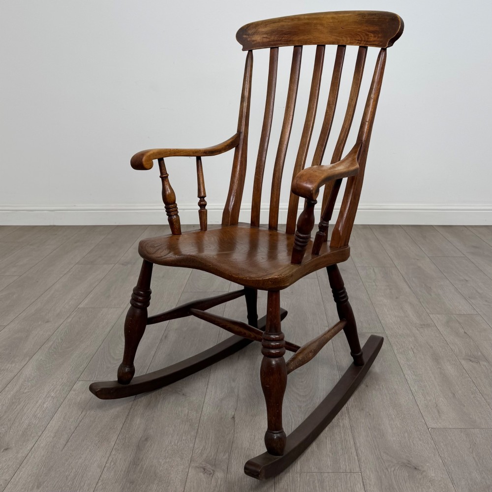 Antique 20th Century Farmhouse Rocking Chair In Elm