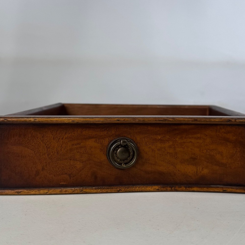 A slender 20th-century mahogany and burr walnut side table featuring two front drawers with brass ring handles and four fluted tapered legs. View XI