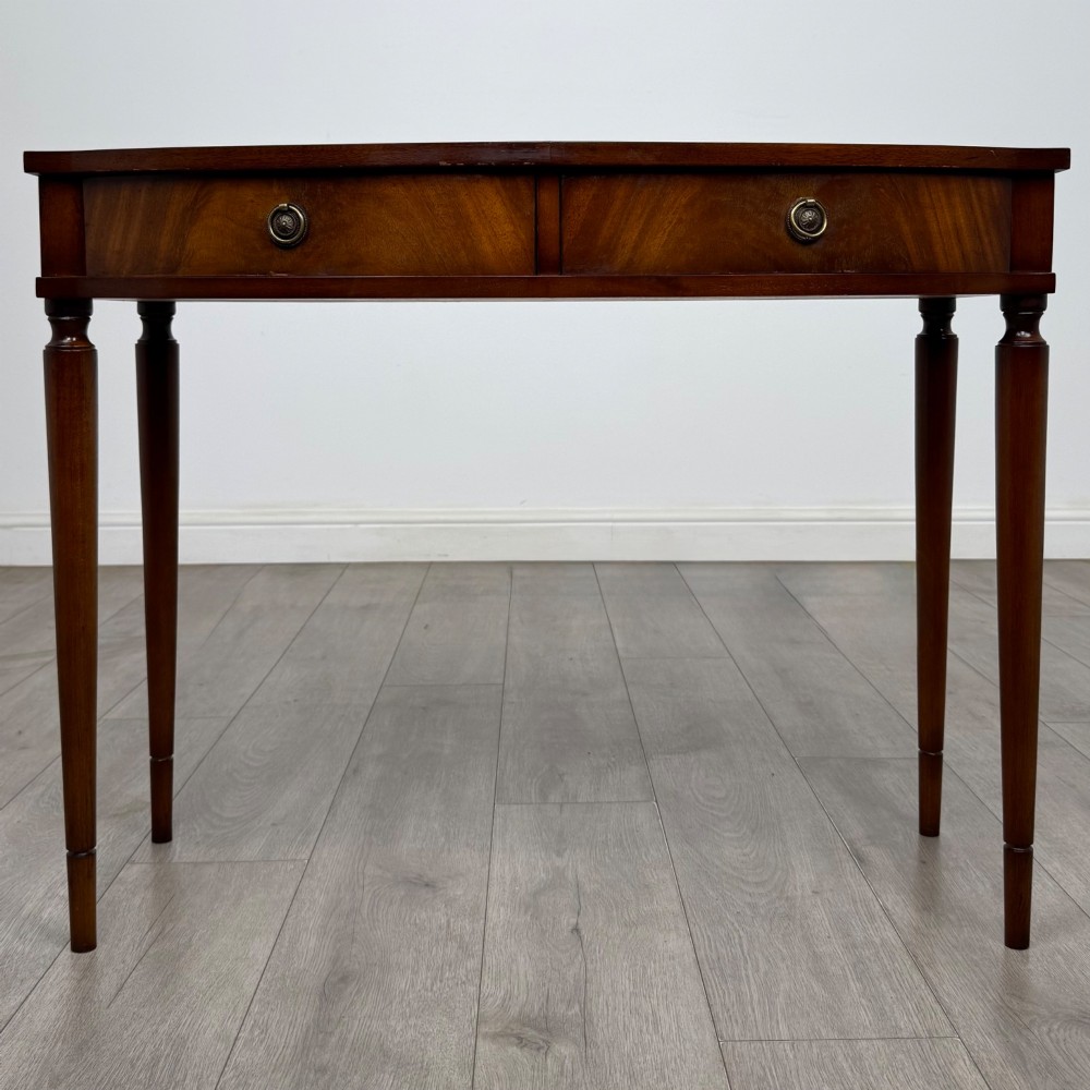 Antique 20th Century Bow Front Writing Table In Mahogany